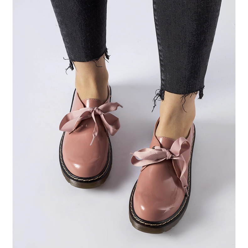 Pink shoes with a decorative bow from Rodriguez 1