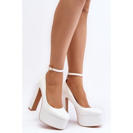Lacquered pumps on a massive platform and a stiletto heel, White Ninames 1