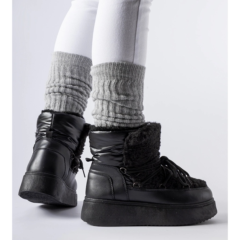 Black snow boots on a massive Elvio platform 1 Black snow boots on a massive Elvio platform 1