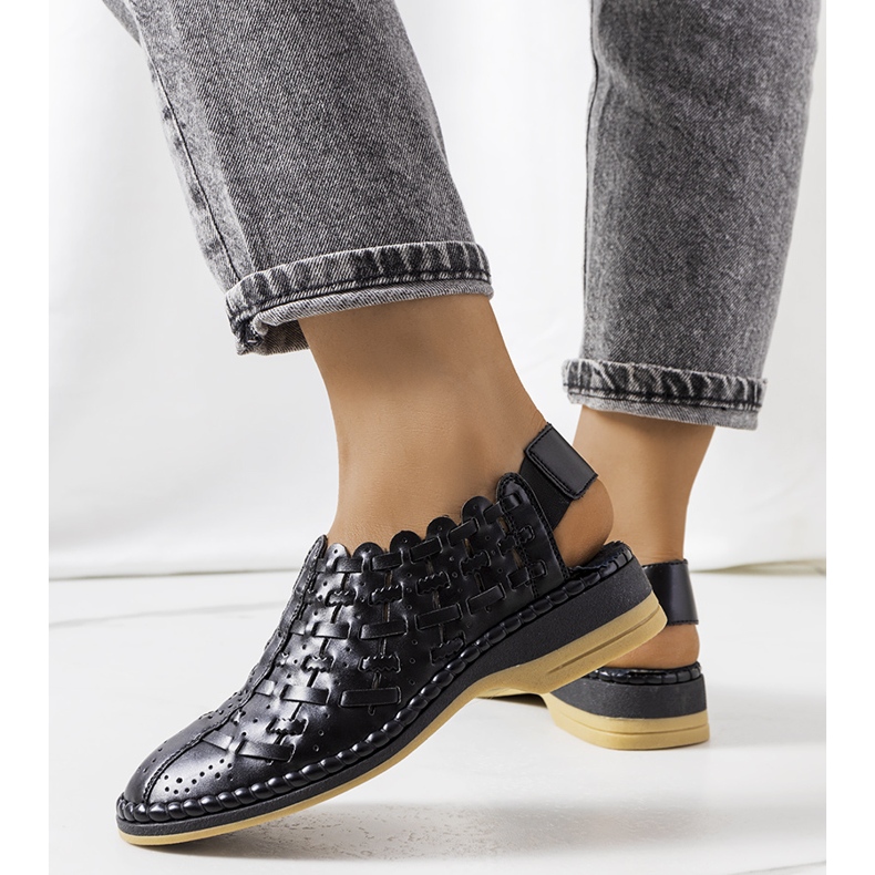 Black openwork sandals from Carvalho 1