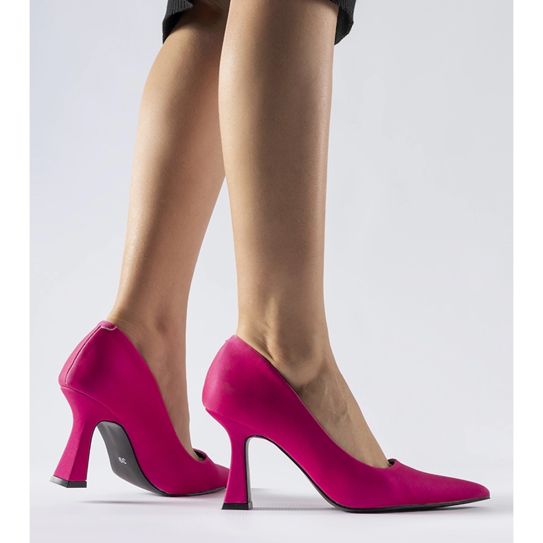 Pink Tore pumps with an asymmetric heel 1