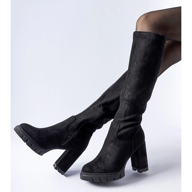 Black boots with a massive Marquette heel 1