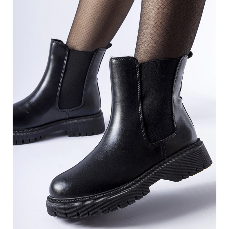 Black insulated classic slip-on ankle boots by Noas 1