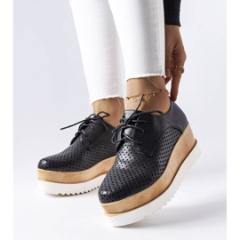 Black openwork wedge shoes from Laurent 1