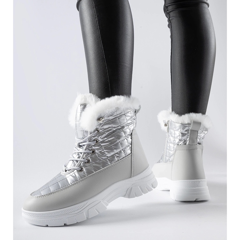 Silver insulated snow boots on the Dwayn platform 1