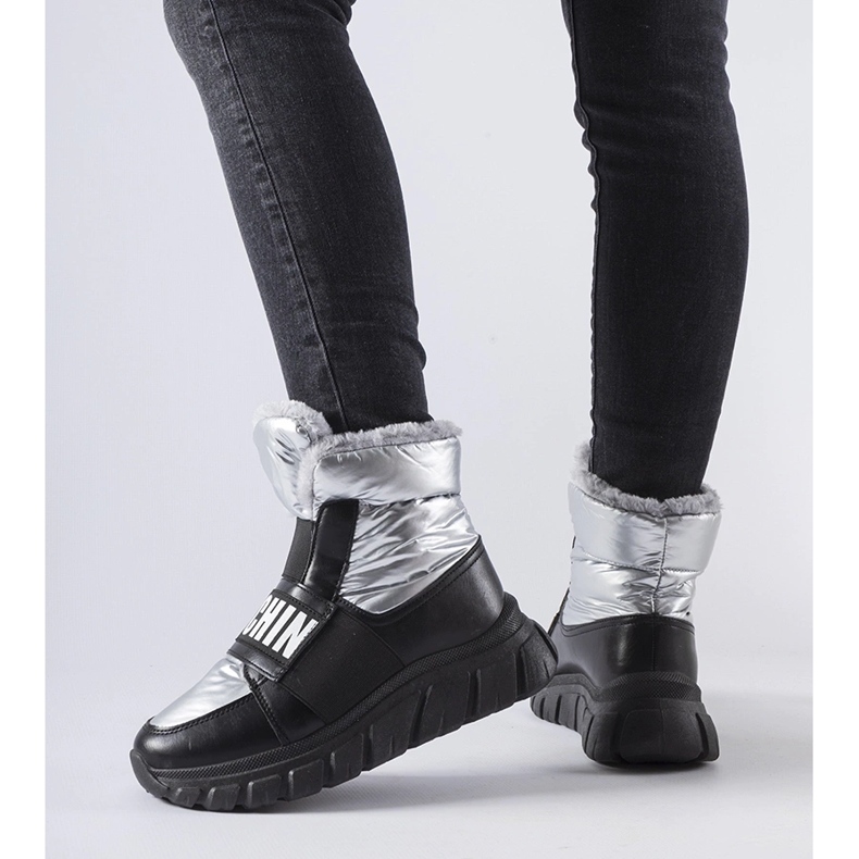 Silver insulated snow boots on the Bend platform 1