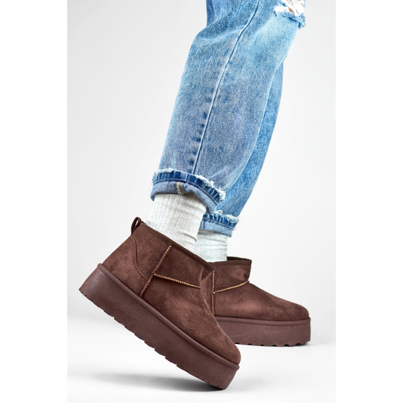 Brown snow boots with a thick sole 1