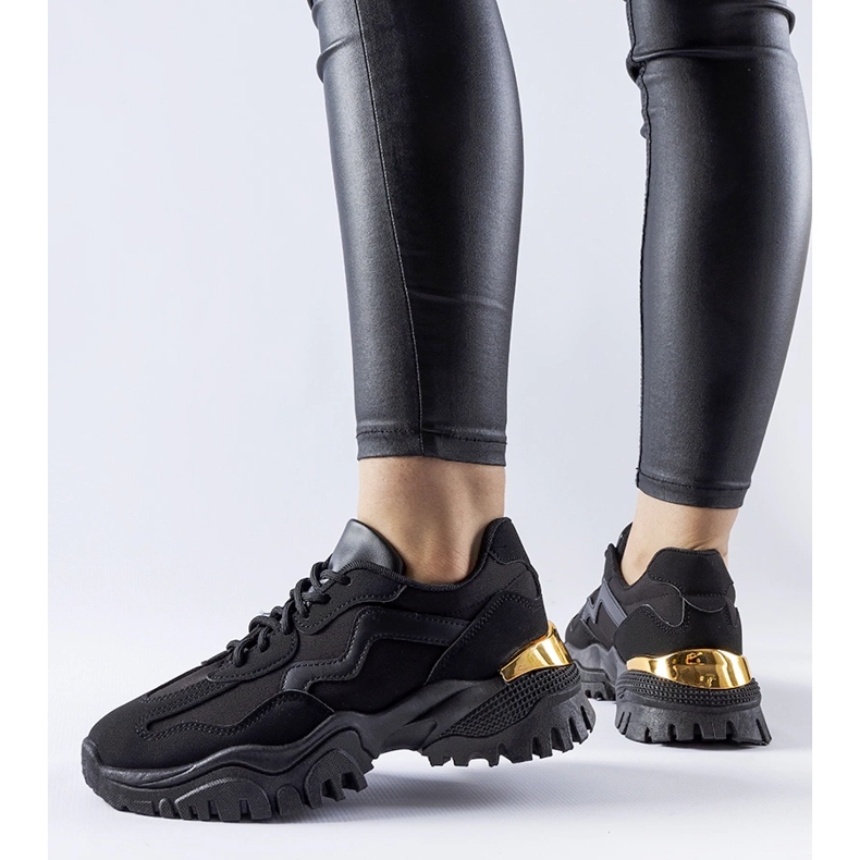 Black sneakers with a massive Gironic sole 1
