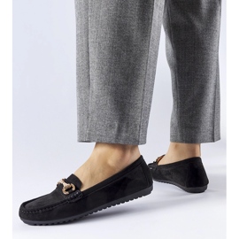 Black moccasins decorated with a Fernanda buckle 1