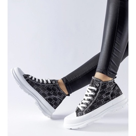 Black sneakers decorated with the Terenzio monogram 1 Black sneakers decorated with the Terenzio monogram 1