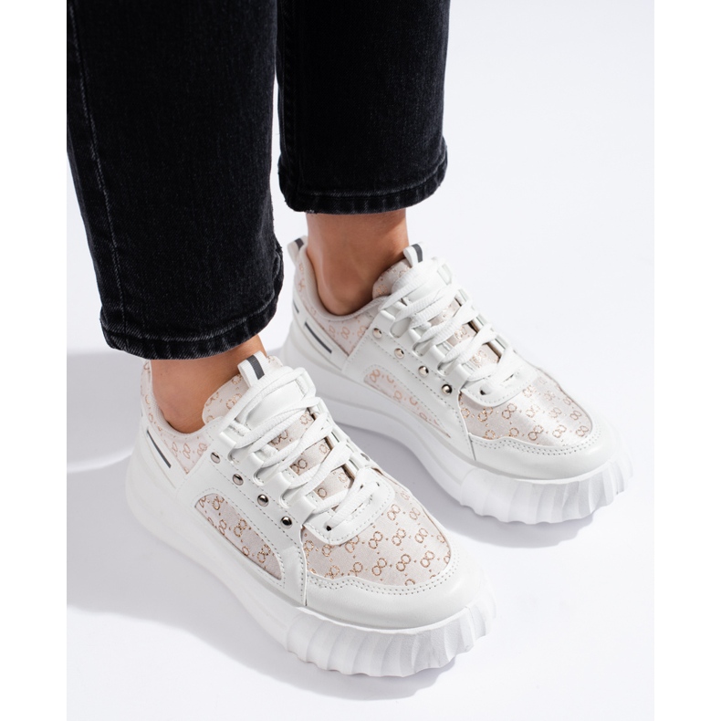 White women's sports shoes with a thick sole 1