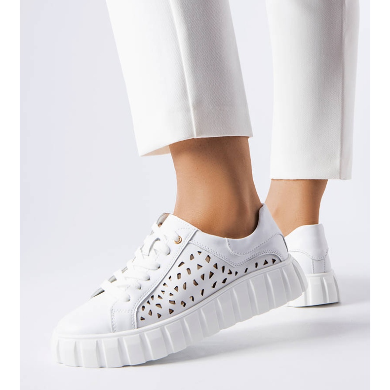 White sneakers with patch inserts 1