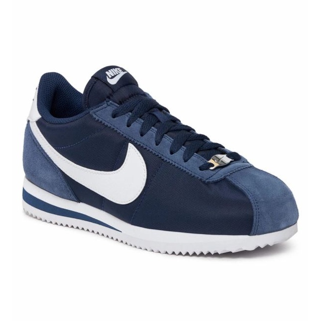 White and navy blue top nike cortez