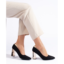 Black suede pumps on the pillar 2