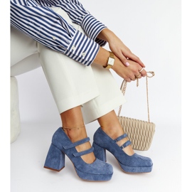 Cher's blue pumps with a massive block heel 1