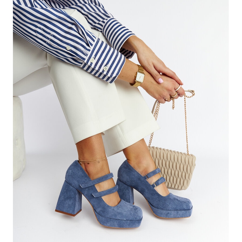 Cher's blue pumps with a massive block heel 1