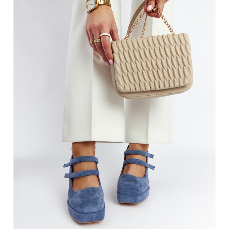 Cher's blue pumps with a massive block heel 2