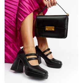 Cher black pumps with a massive block heel 1