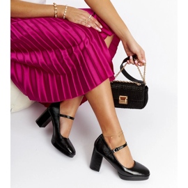 Cher black patent heel pumps 1