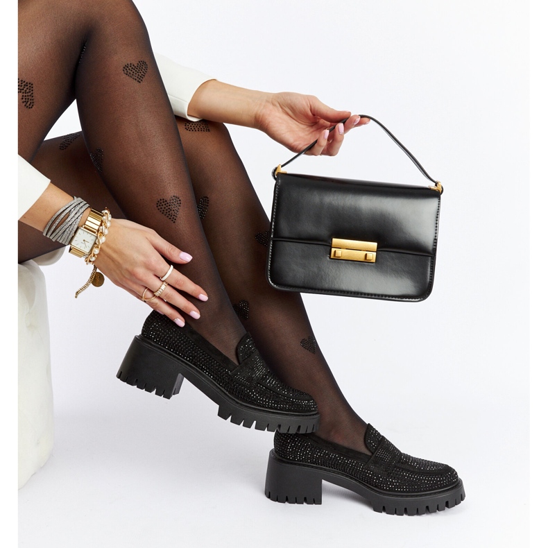 Black moccasins with a massive Parent heel 1