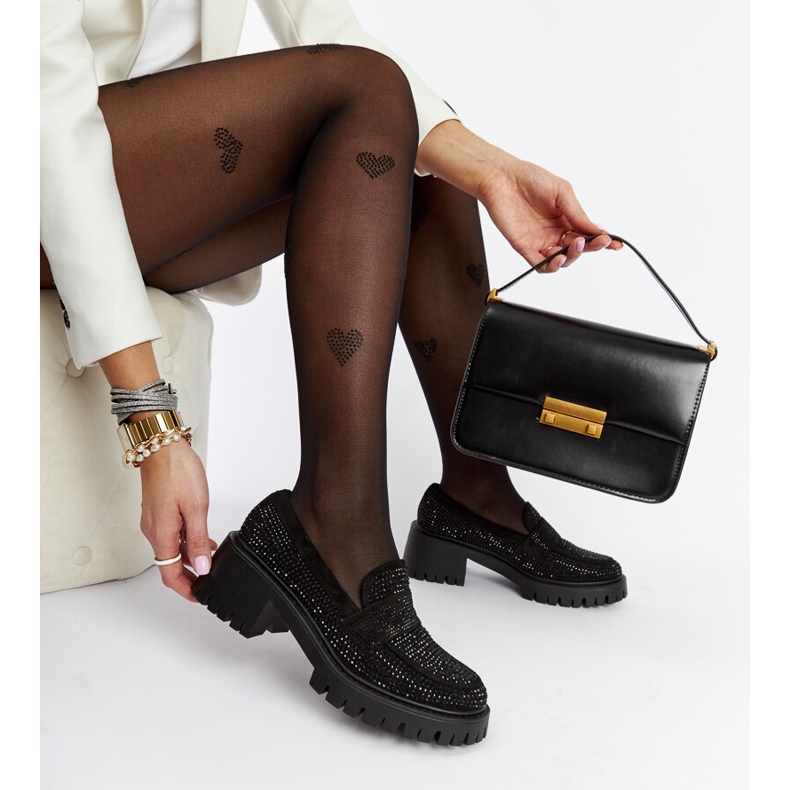 Black moccasins with a massive Parent heel 2