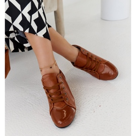 Brown shoes with a patent toe from Parady 1