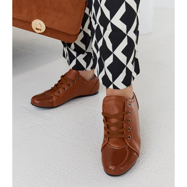 Brown shoes with a patent toe from Parady 2