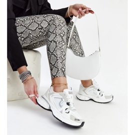 White sneakers with a massive Jacobine sole 1