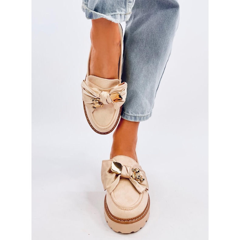 Pennsy Beige moccasins with a decorative teddy bear 1