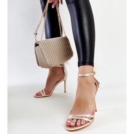 Beige sandals with feathers from Adalgisio 1