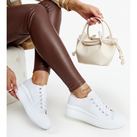 White sneakers on a thick Zlata platform 1