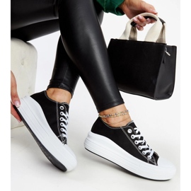 Black sneakers on a thick Zlata platform 1