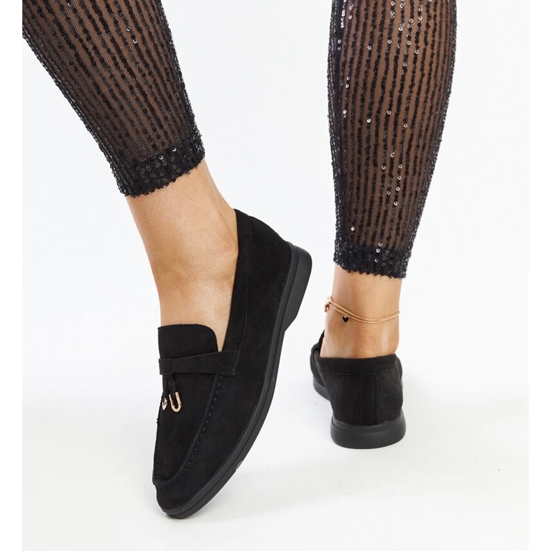 Black moccasins with a metal pendant from Fiorano 1