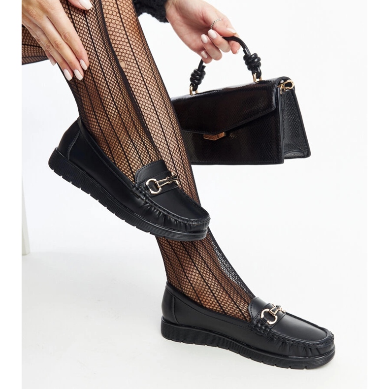 Black loafers with a buckle from Anisah 1