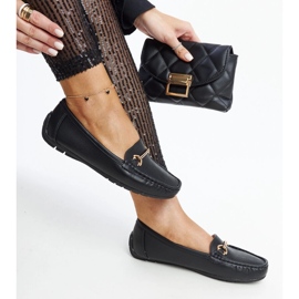 Black moccasins with a decorative buckle by Adila 1