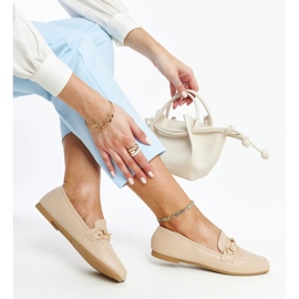 Beige decorative moccasins by Docherty 1