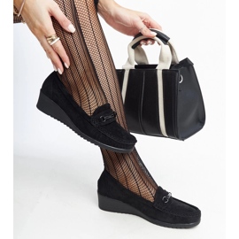 Amel's black wedge loafers 1