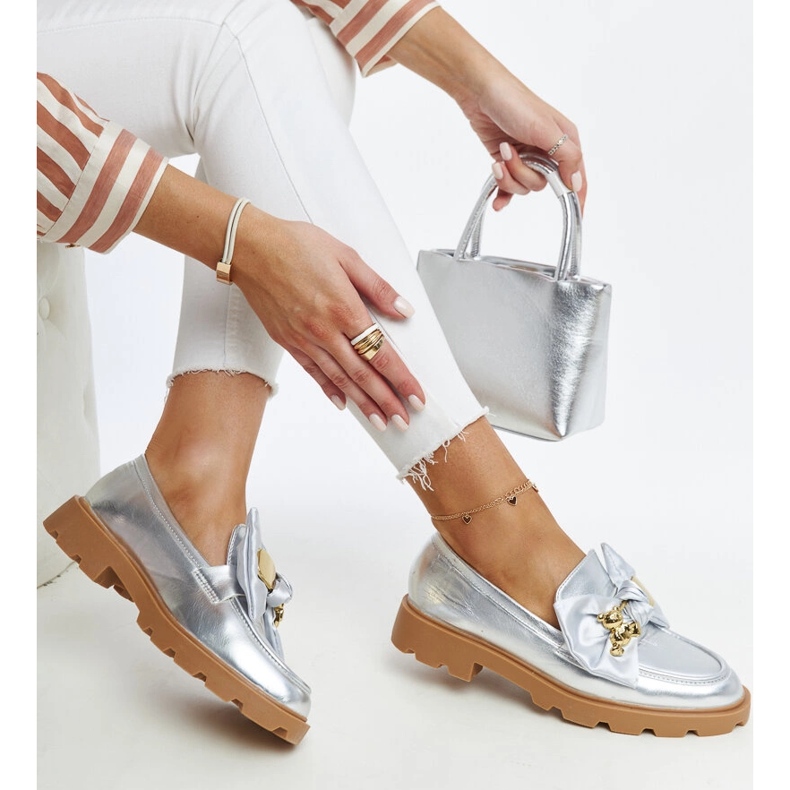 Silver moccasins with a decorative safety pin by Bogumil 1