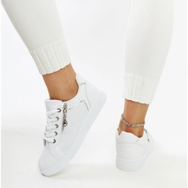 White sports shoes decorated with Chiusi perforation 1