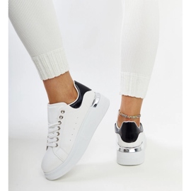 White sports shoes with a black Meriana insert 1