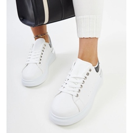 White sports shoes with a black Meriana insert 2