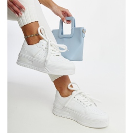 White sneakers with a thick Galit sole 1