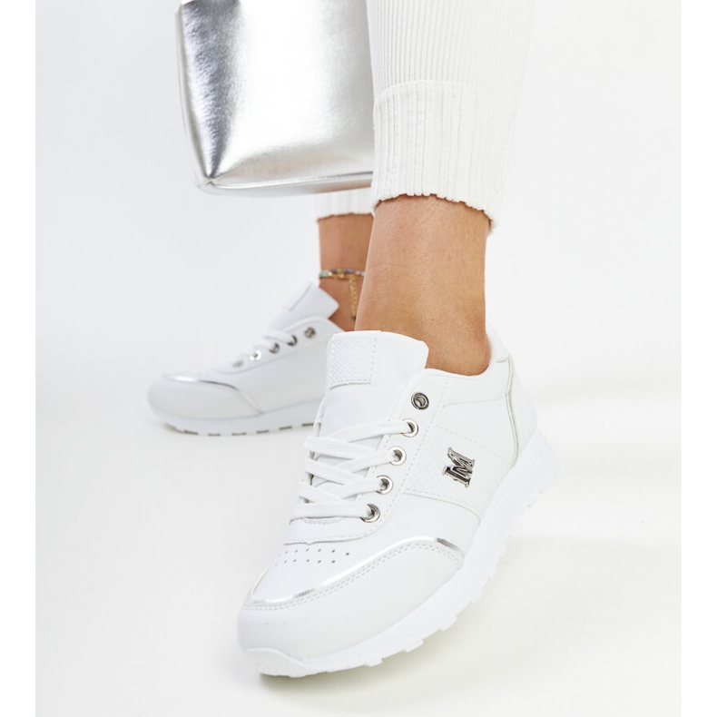 White sneakers with a thick Kincheloe sole 2