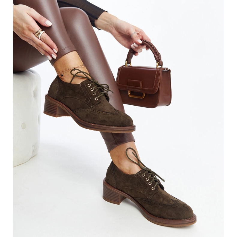 Green suede high-heeled shoes from Tigard 1