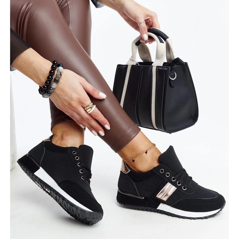 Black sneakers on a Nihad rubber platform 1