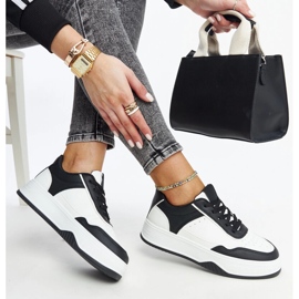 White and black sneakers with a thick Rumai sole 1 White and black sneakers with a thick Rumai sole 1