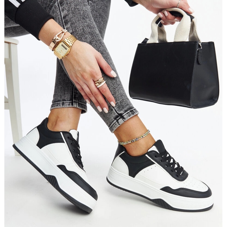 White and black sneakers with a thick Rumai sole 1 White and black sneakers with a thick Rumai sole 1