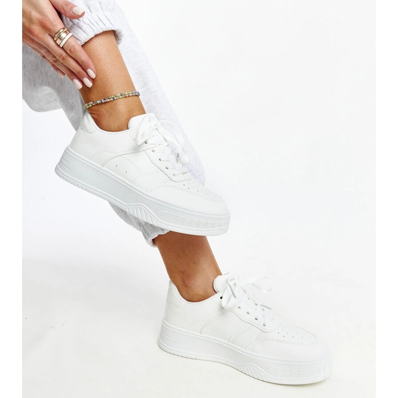 White sneakers with a thick sole from Rafida 2