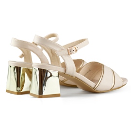 Elegant beige women's sandals with a gold heel 1