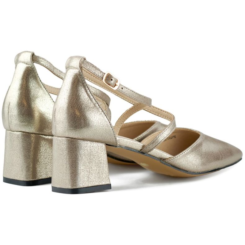 Silver pumps with straps on a low heel 1